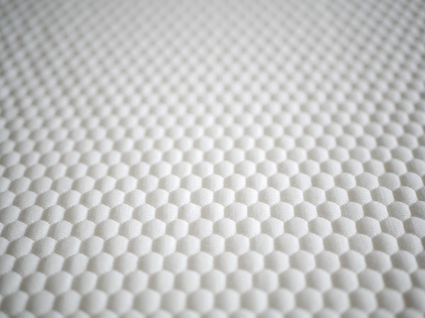 surface du sur-matelas Eve